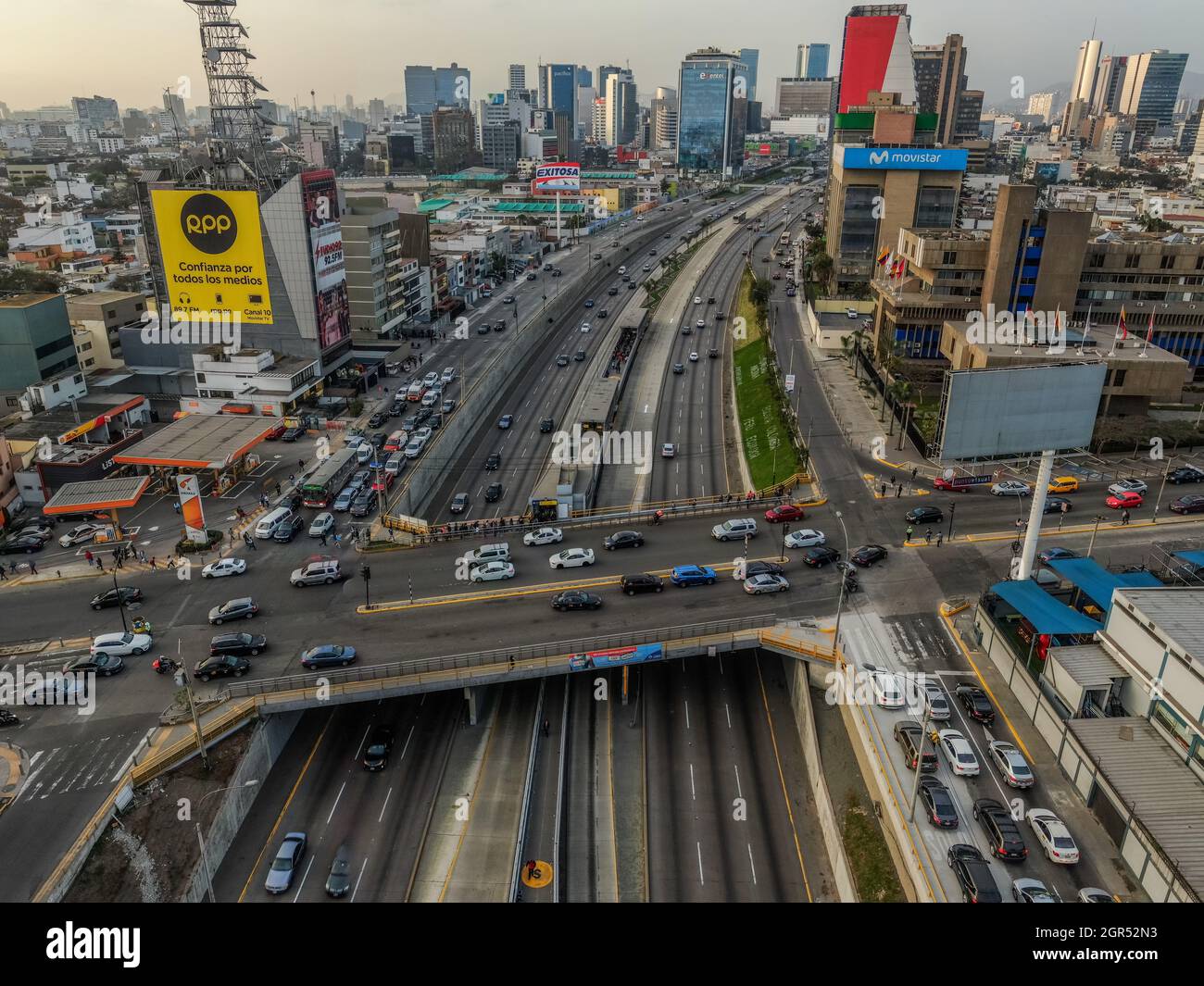 Lima, Peru - 17.09.2019: Aerial view over the busy traffic of Aramburú bridge over BRT Metropolitano in Miraflores district of Lima, Peru Stock Photo