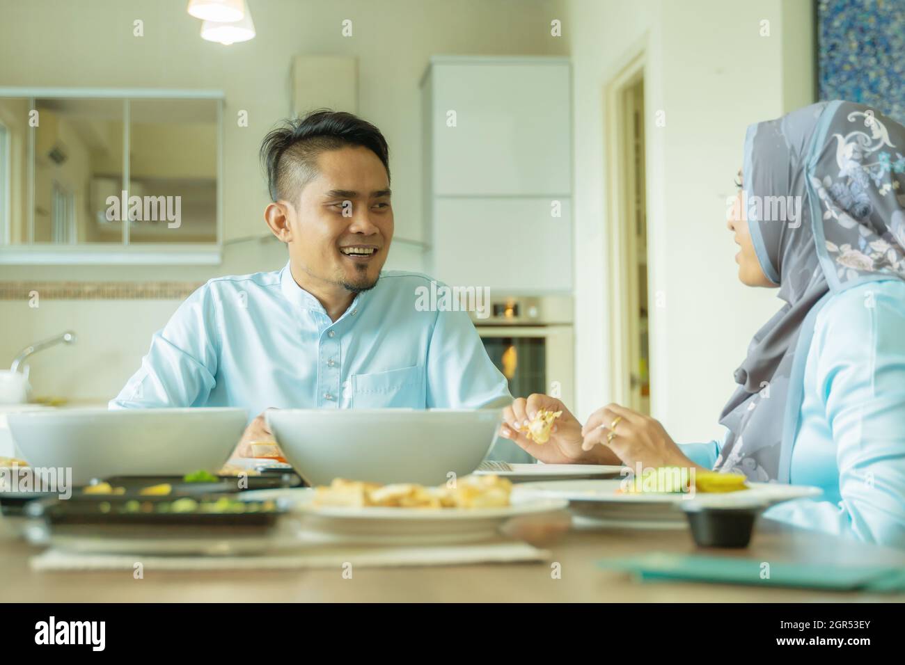 Eid Mubarak Celebration Moment Malay Husband And Wife At The Dining Table Happy Asian Family Stock Photo Alamy