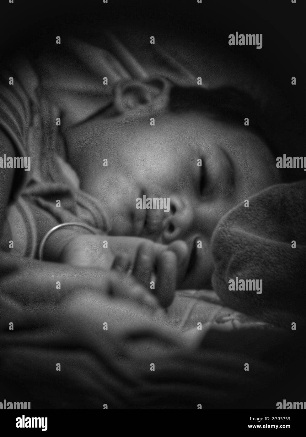 Baby sleeping dark room hi-res stock photography and images - Alamy