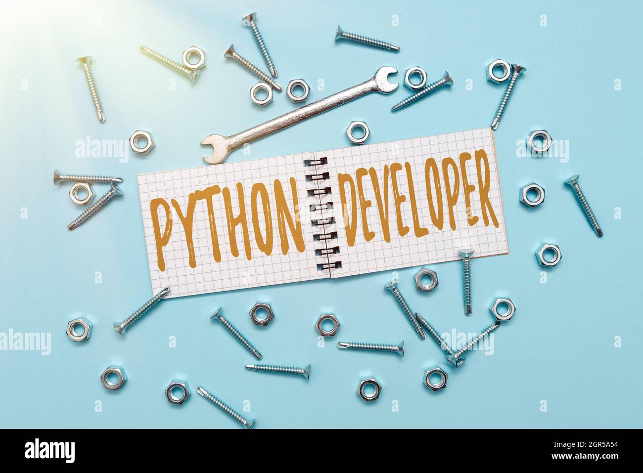 Handwriting text Python Developer. Conceptual photo responsible for writing serverside web application logic Maintenance Tools And Equipments Mechanic Stock Photo