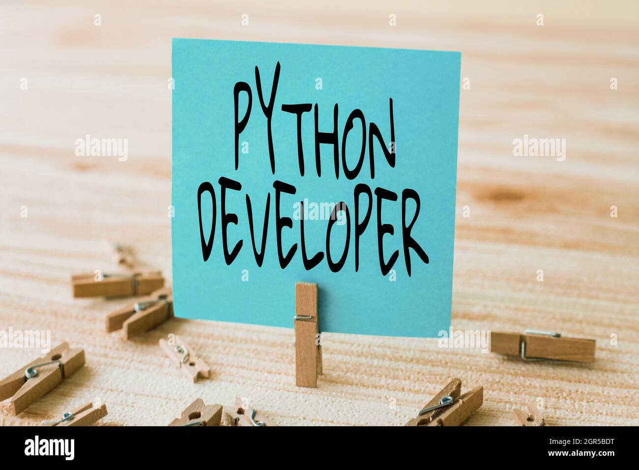 Text sign showing Python Developer. Concept meaning responsible for writing serverside web application logic Piece Of Blank Square Note Surrounded By Stock Photo