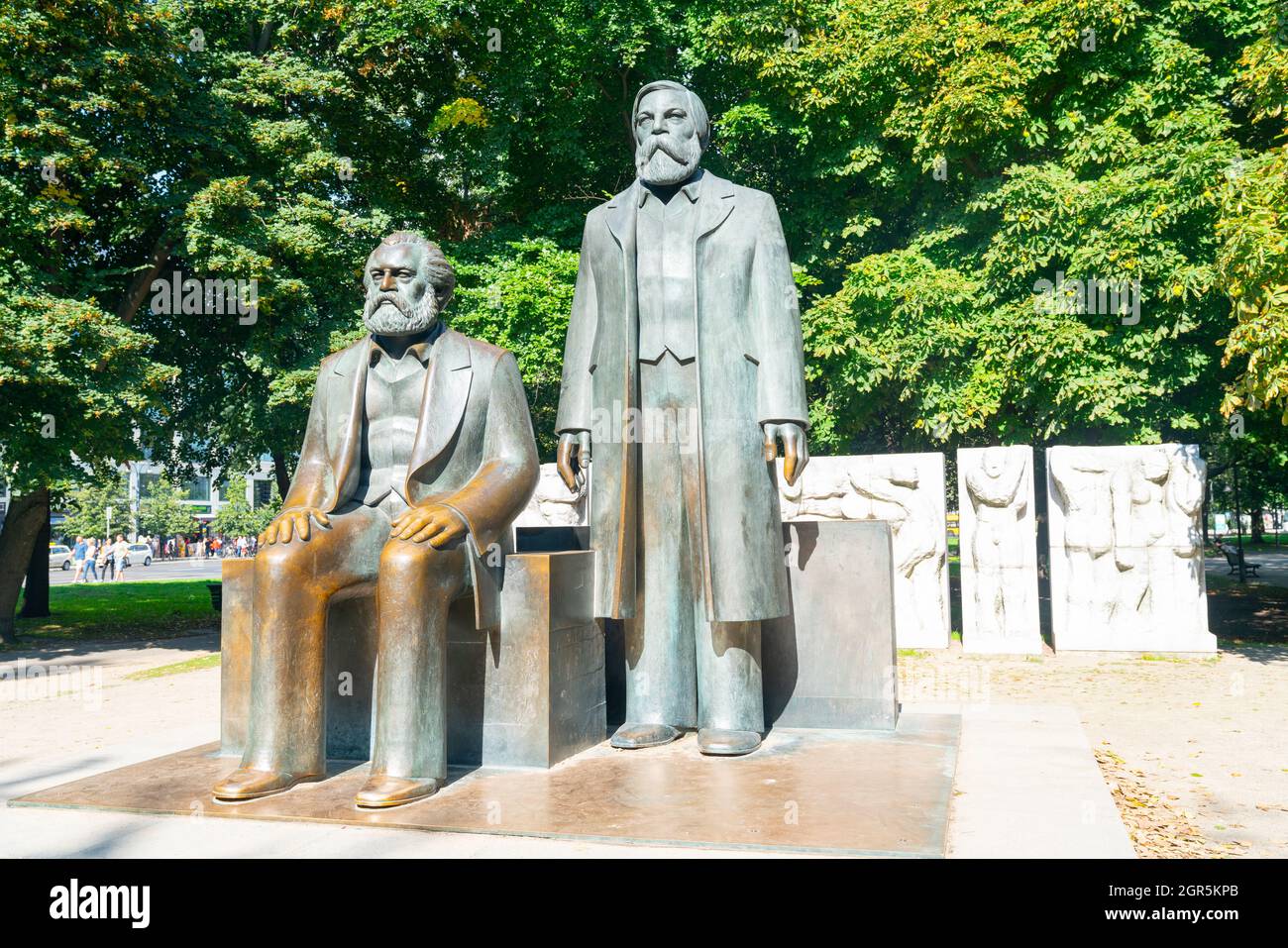 Berlin, Germany - April 17th 2011: Two bearded men statues of Karl Marx and Friedrich Engels located in Marx-Engels-Forum in city, Marx and Engels we Stock Photo