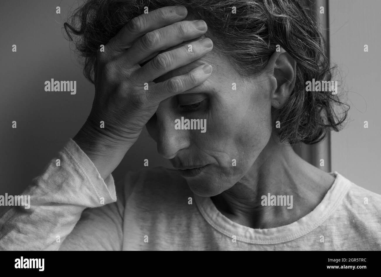 Woman hand in front of face distressed hi-res stock photography and ...
