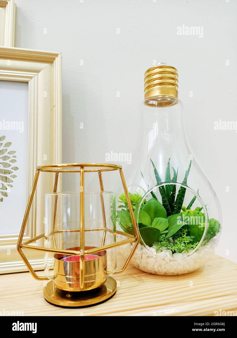 Mini Cactus Garden In Glass Bowl Beside The Candle Holder Stock Photo -  Alamy