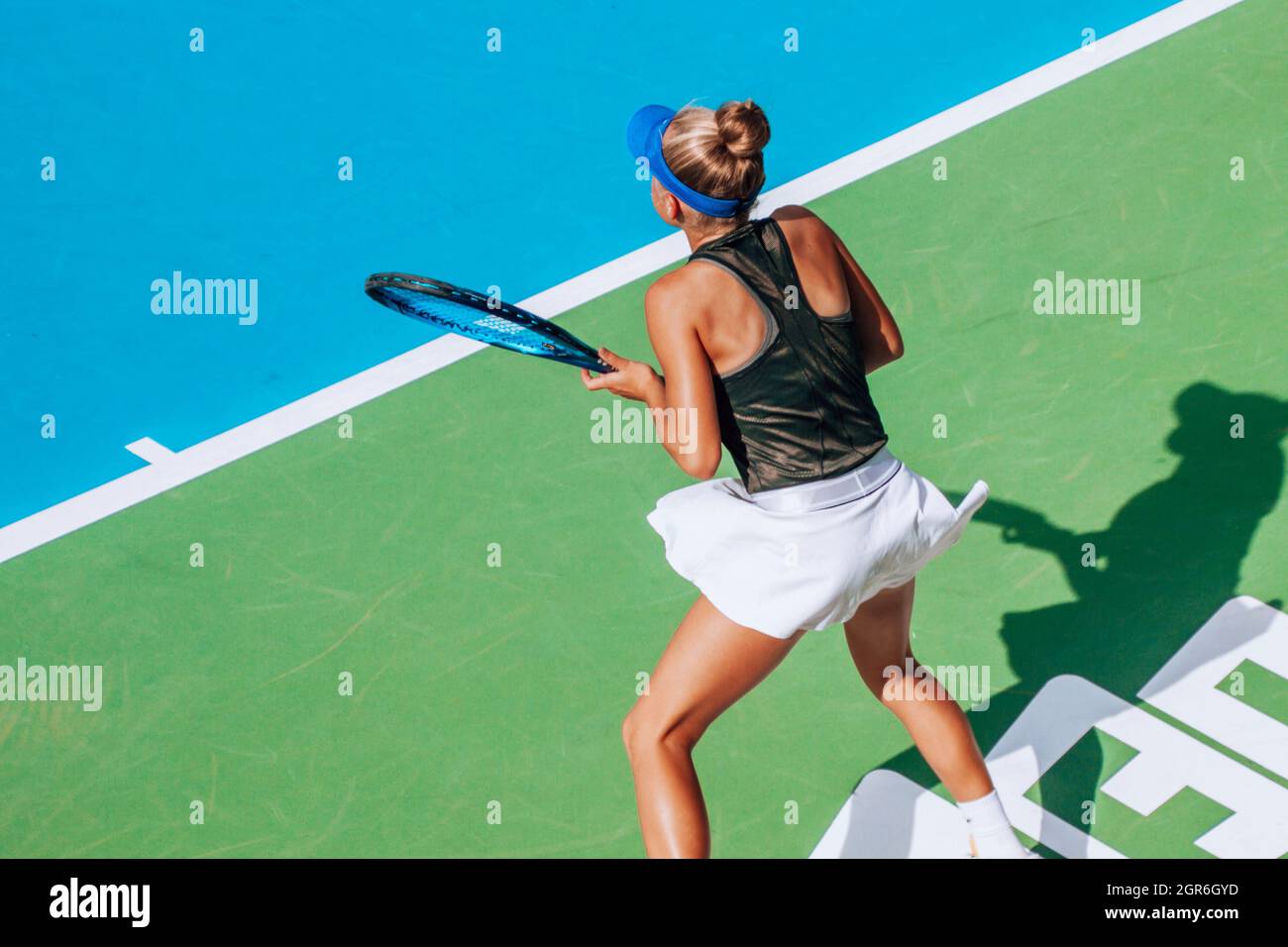 Girl Playing Tennis, Competitive Sport, Action Shot Stock Photo