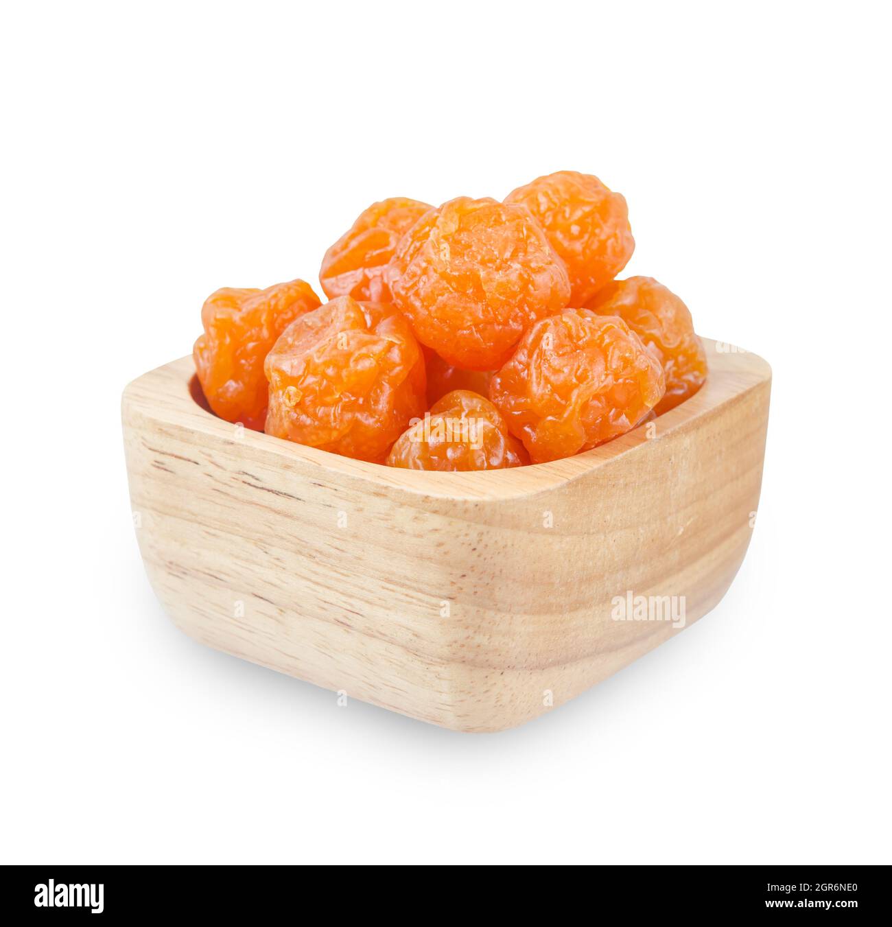 Dried prunes fruits (Preserved fruits Chinese plum) in wooden bowl