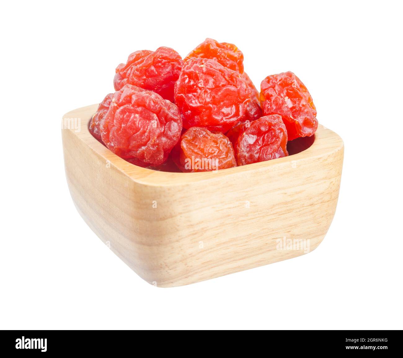 Dried red prunes fruits (Preserved fruits Chinese plum) in wooden bowl