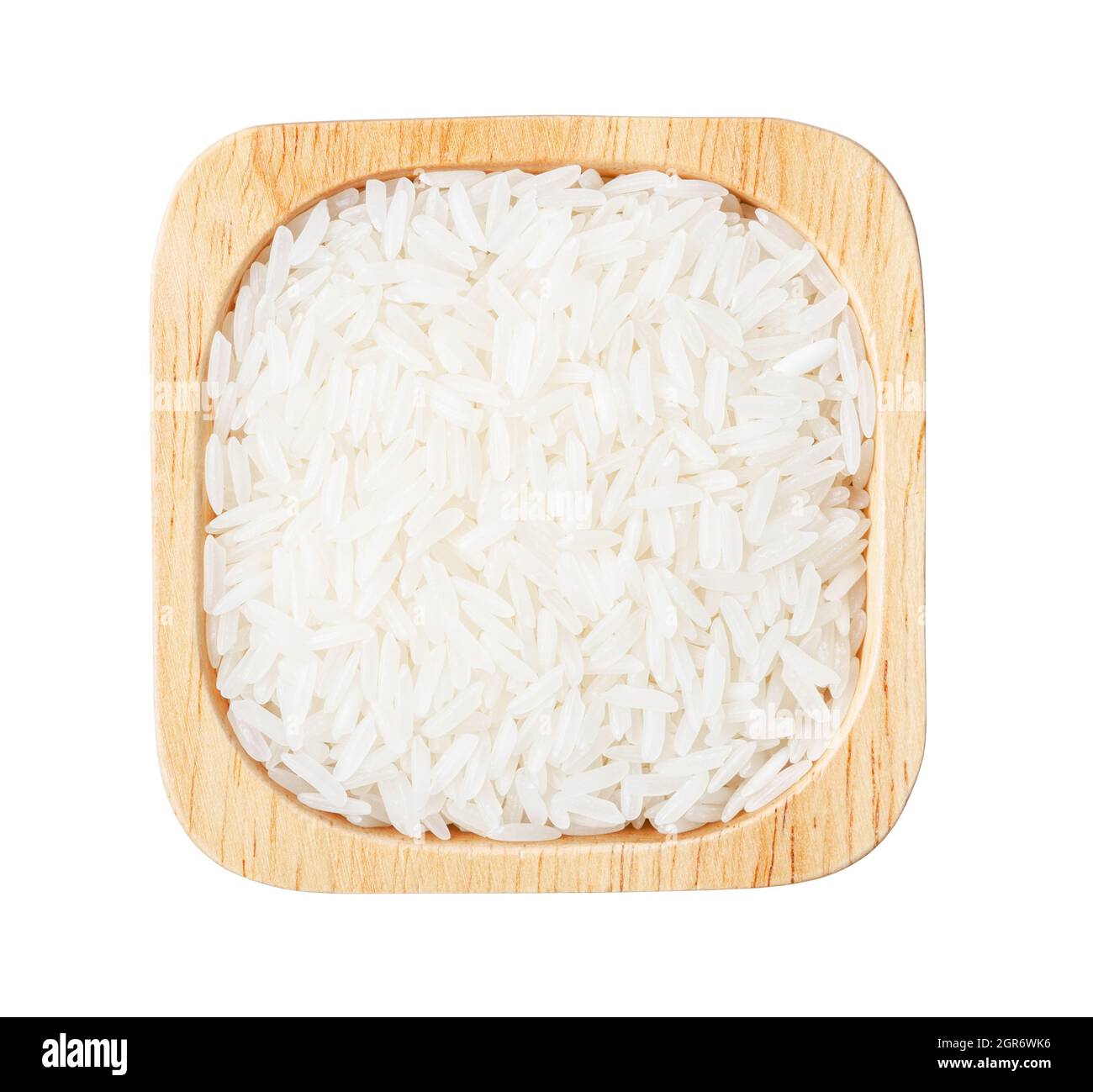 Raw white rice in wooden cup isolated on white background, Save ...