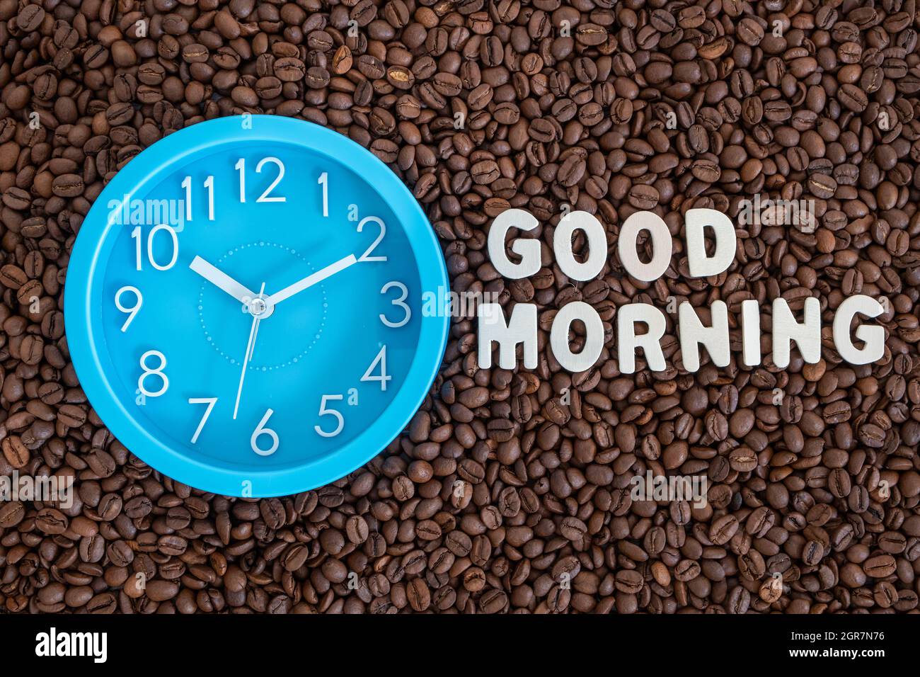 Blue Clock With Good Morning Words On Brown Coffee Beans ...
