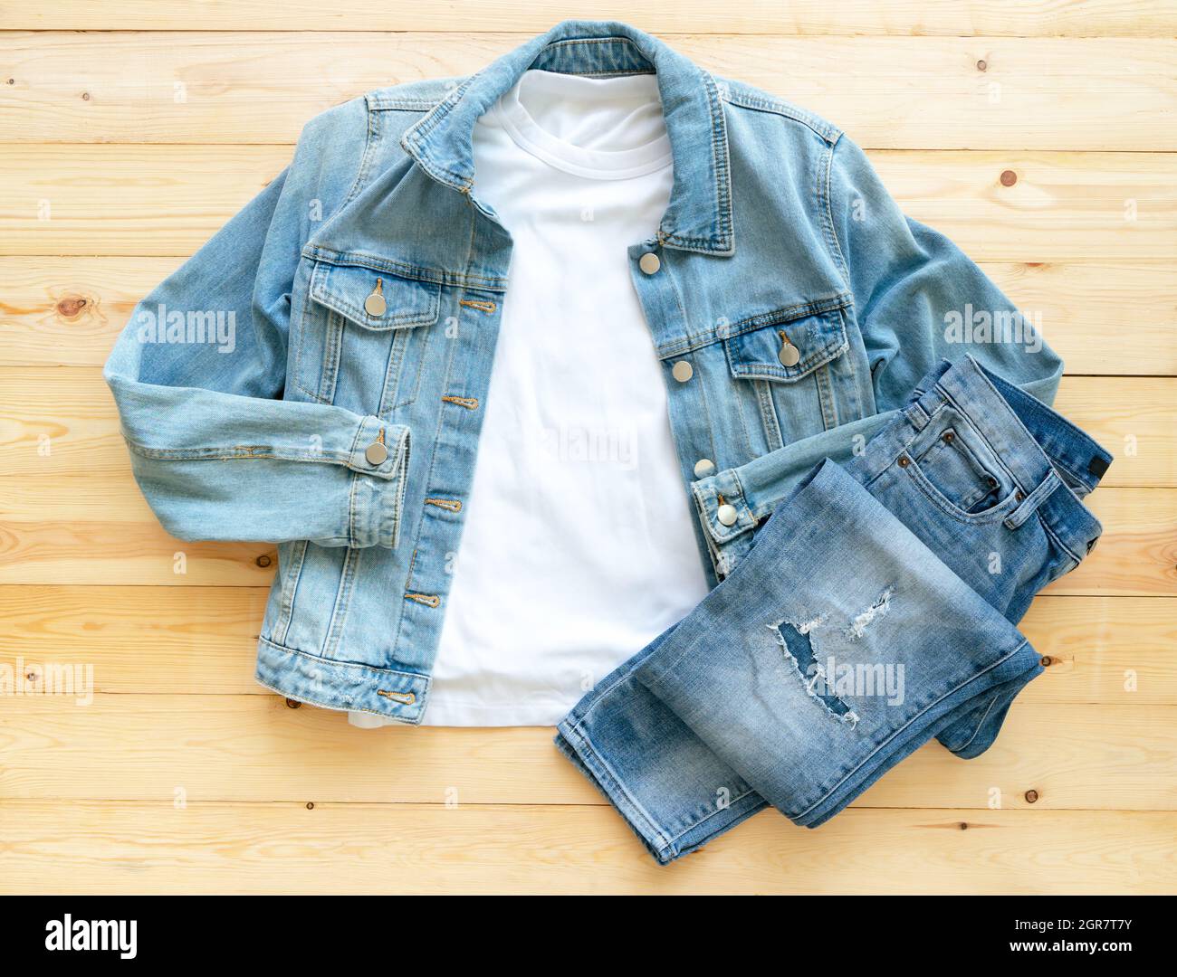 White Tshirt Mockup And Denim Jacket Jeans On Brown Wooden Background.  Template, Flat Lay Stock Photo - Alamy