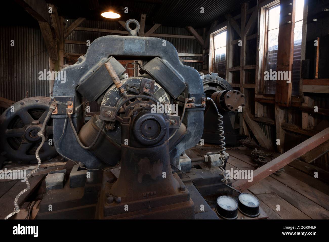 Direct Current Generator in the motor room of the Standard Stamp Mill in Bodie, California Stock Photo