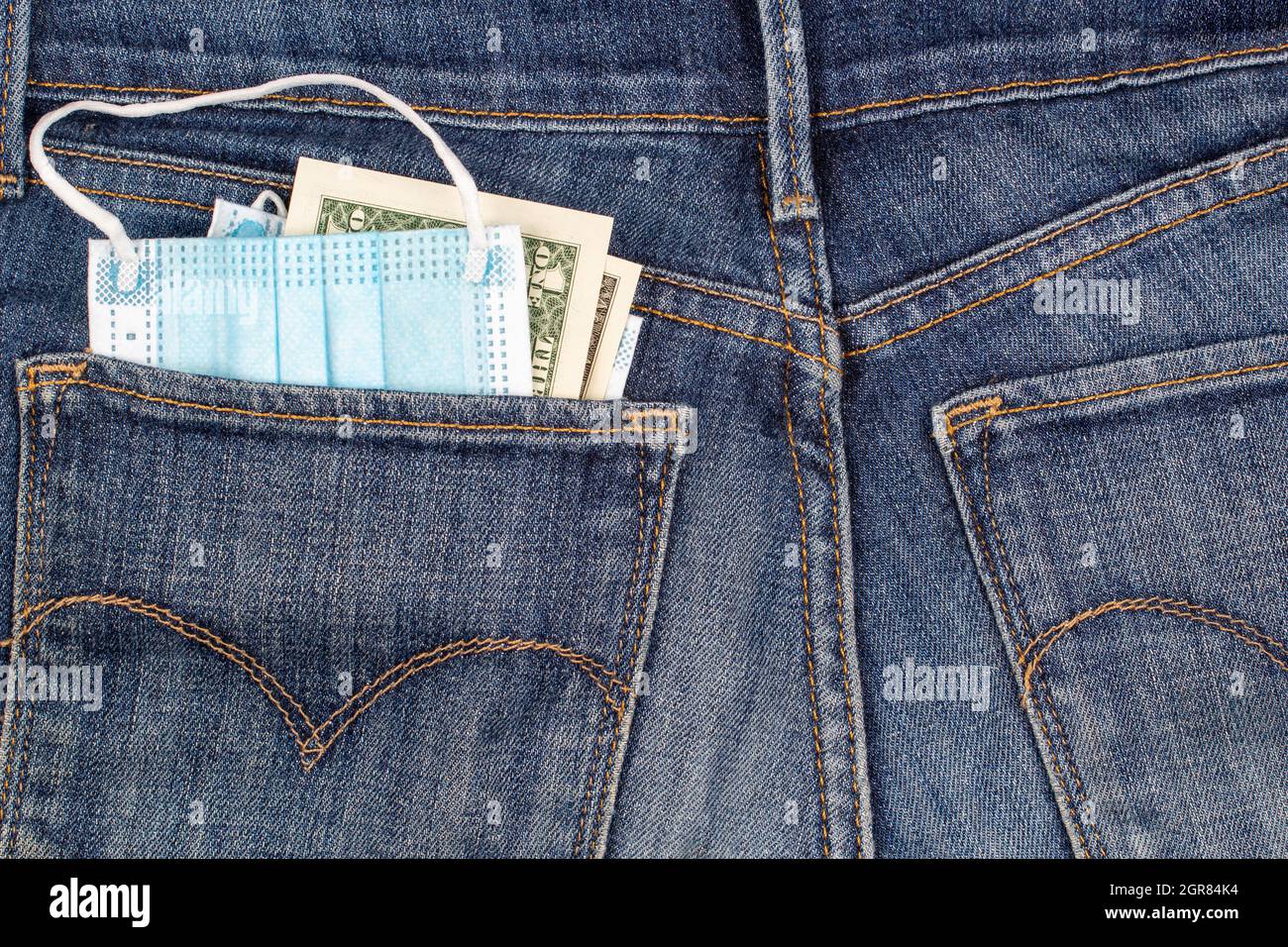Medical mask in jeans pocket hires stock photography and images Alamy