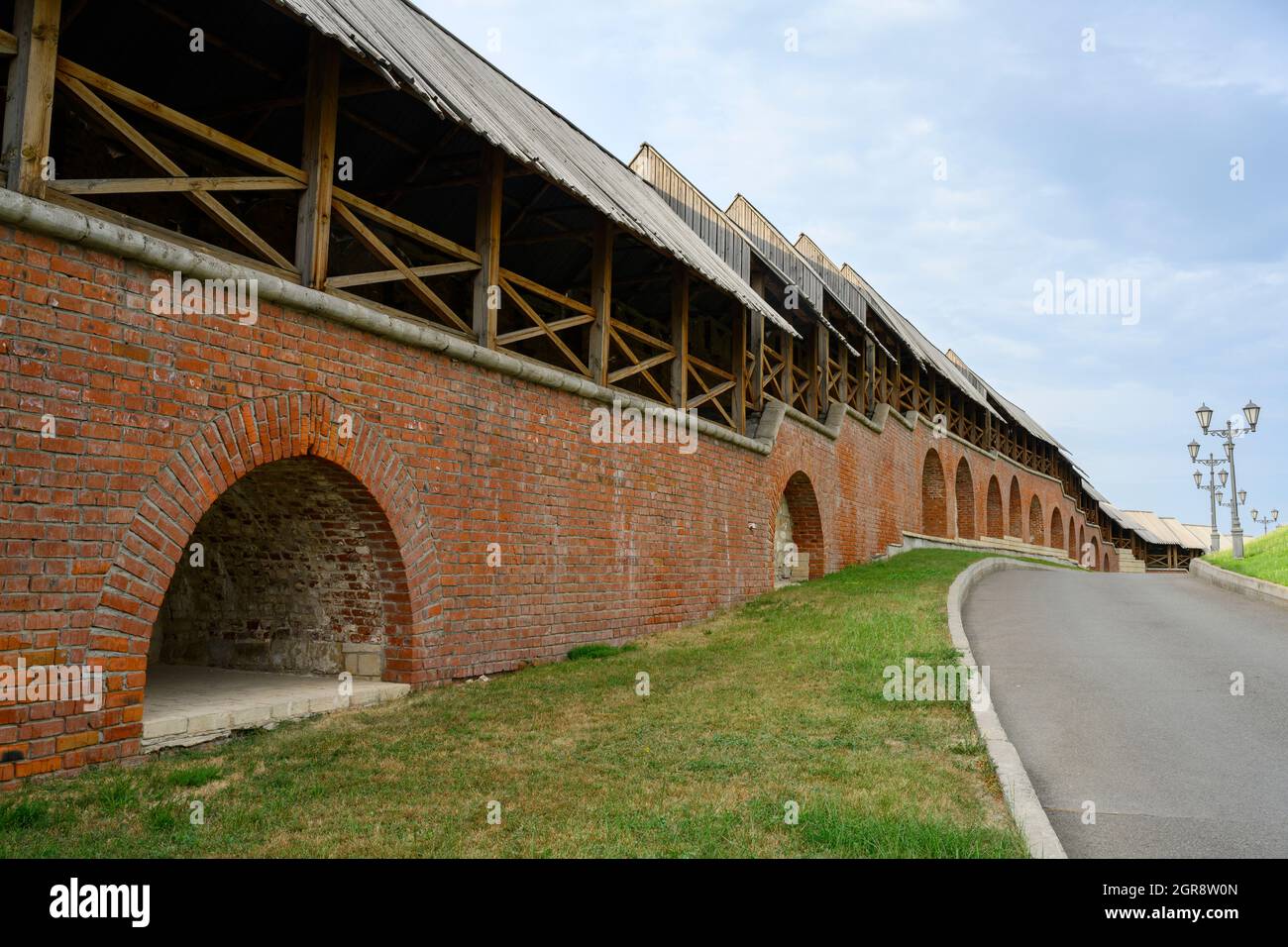 View of the red brick walls of the fortress of the ancient Kremlin from ...
