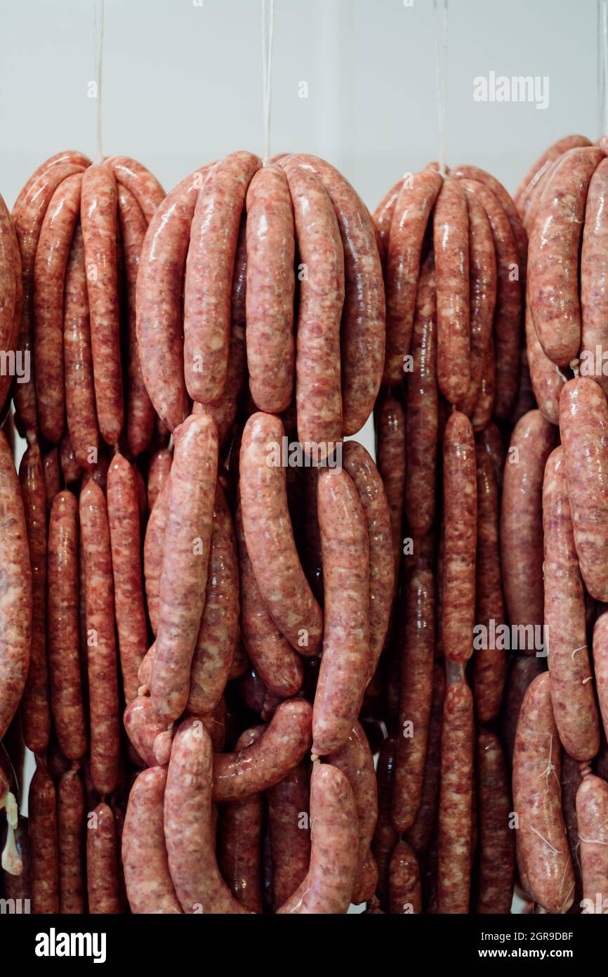 Close-up Of Roasted Meat Hanging At Market Stall Stock Photo