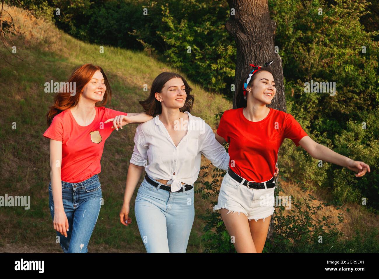 Woman dancing beach jeans hi-res stock photography and images - Alamy
