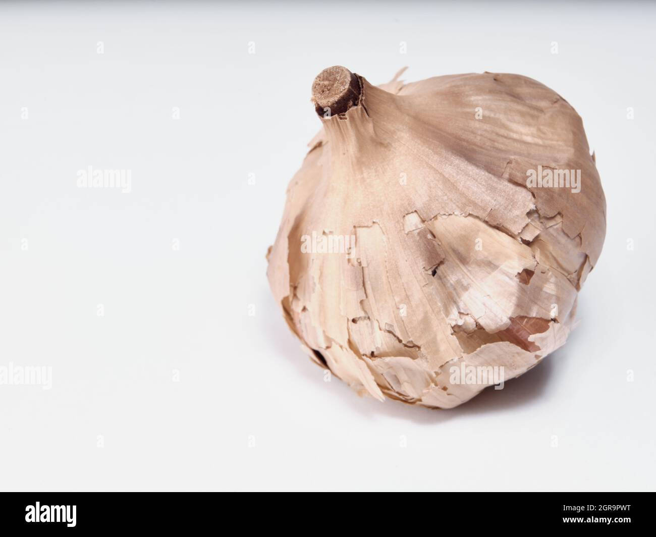 Black garlic isolated on white background Stock Photo