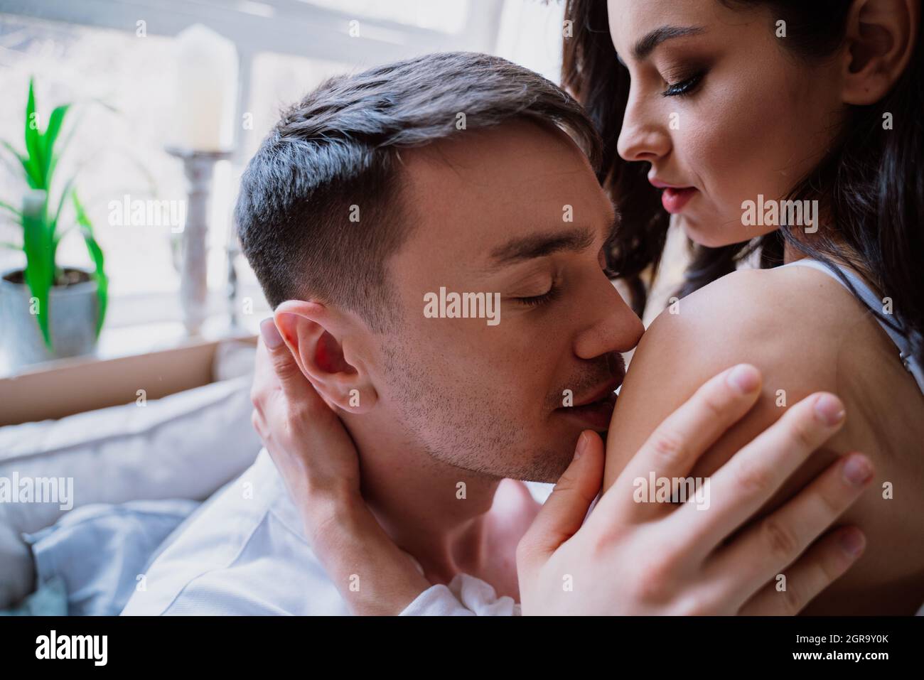 Close-up Portrait Of Young Couple Stock Photo