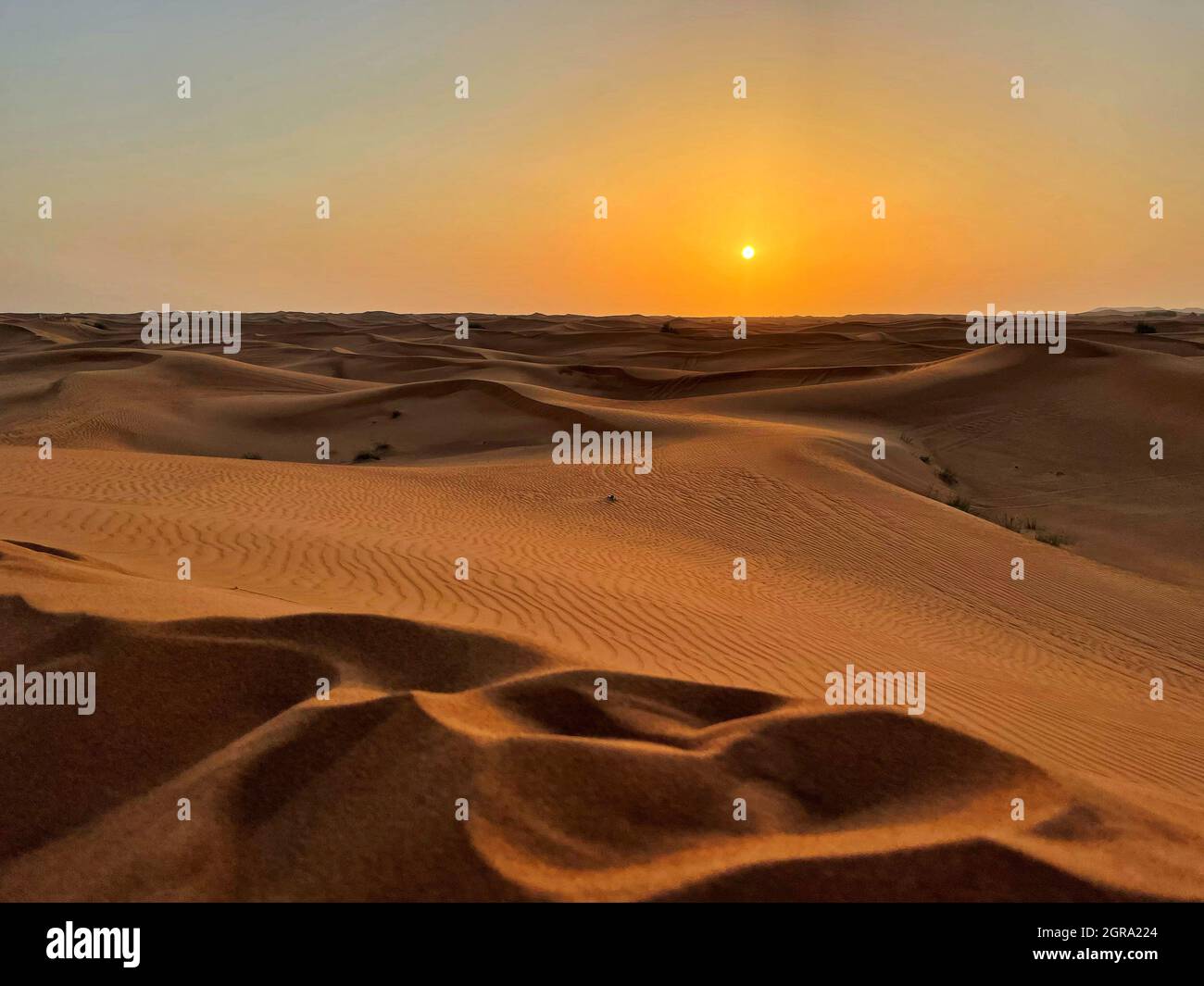 Scenic View Of Desert During Sunset Stock Photo