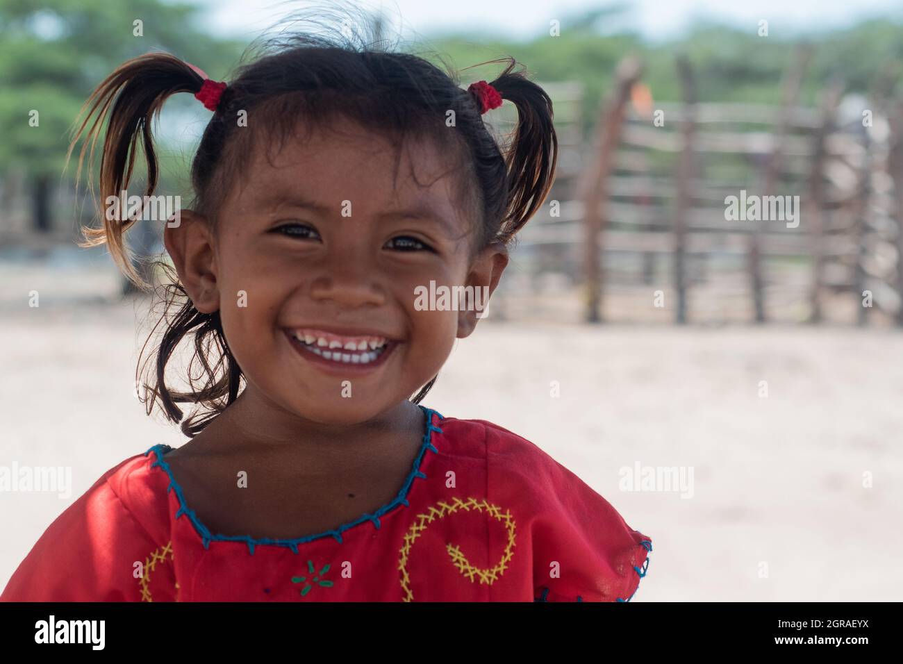 Mayapo, Colombia. 26th Sep, 2021. A child poses for a portrait during a Humanitarian Mission developed by 'De Corazon Guajira' in Mayapo at La Guajira - Colombia were they visited the Wayuu indigenous communities 'Pactalia, Poromana, Perrohuila' on September 26, 2021. The Guajira region in Colombia is the poorest region in Colombia, with its people commongly living without drinkable water, electricity and food. Credit: Long Visual Press/Alamy Live News Stock Photo