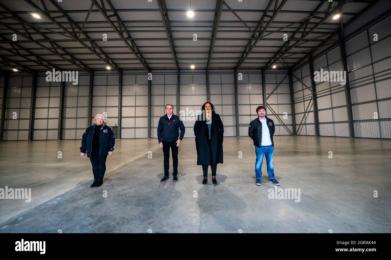 (left to right) Lynn Saunders, head of the Liverpool Film Office, Steve Rotheram, Metro Mayor of Liverpool, Joanna Anderson, Mayor of Liverpool, and Kevin Bell, operations manager at the Liverpool Film Office, at The Depot, Liverpool's new 40,000 square foot purpose-built film and television shooting space. Picture date: Thursday September 23, 2021. Stock Photo