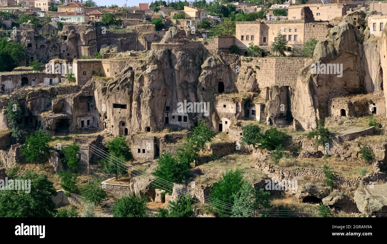 cliff dwelling in Turkey rock cut cave houses of Guzelyurt in central