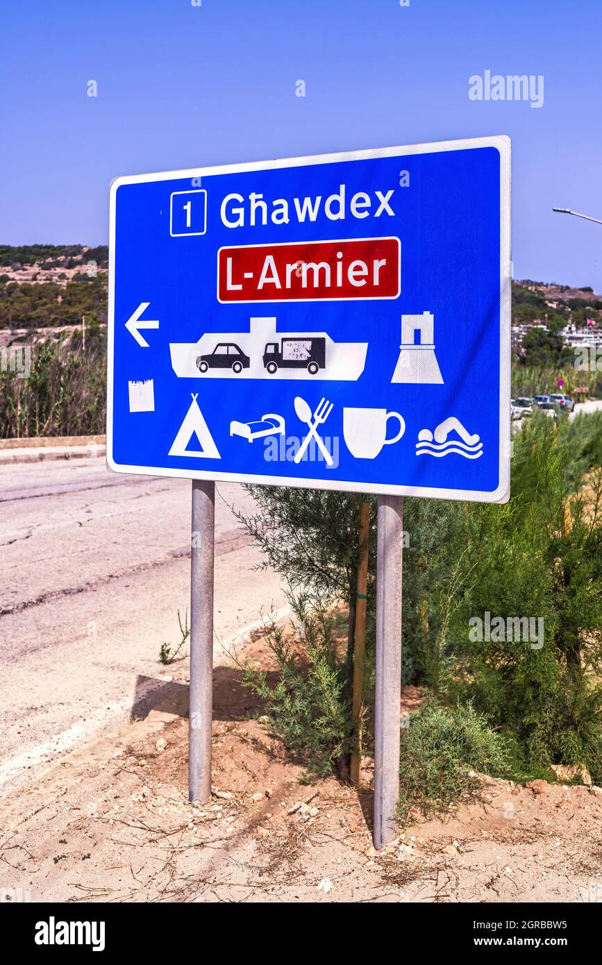 Malta, Mellieha Typical Maltese blue road sign showing the way to some