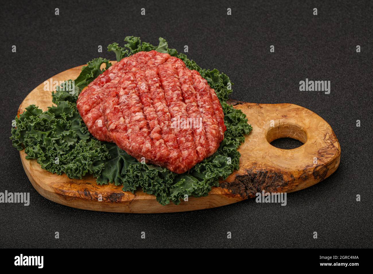Raw beef burger cutlet for grill Stock Photo Alamy