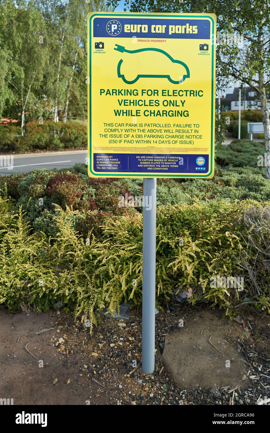 Parking space and charging point for an electric vehicle. Stock Photo