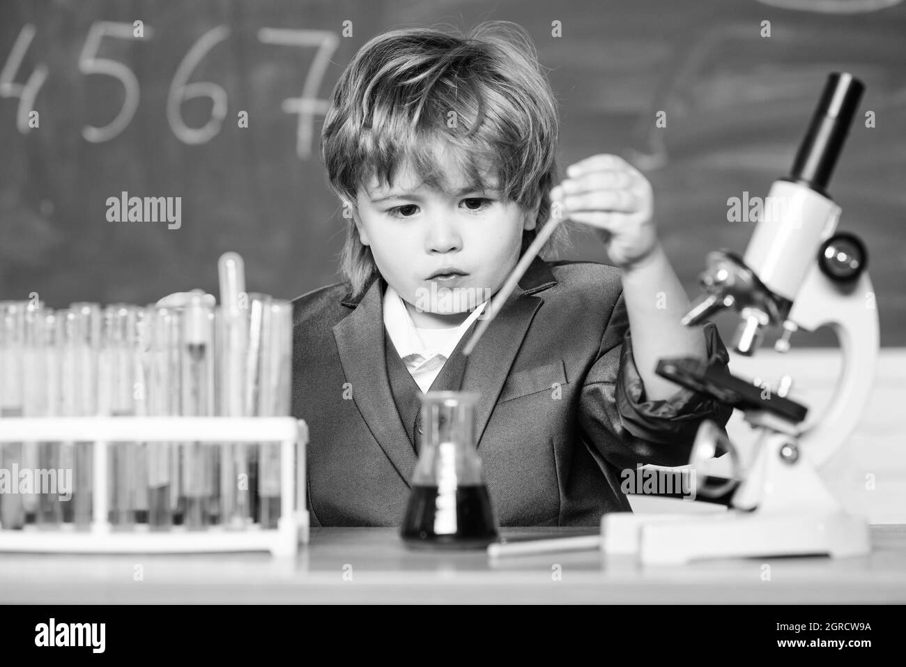 boy in lesson biology science. Little boy is making science experiments. little boy at  lesson. Back to school. school kid scientist studying science. science  Stock Photo - Alamy