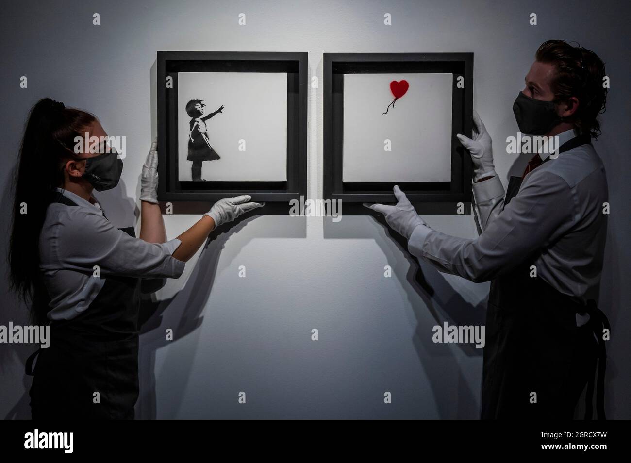 EMBARGOED till 10.30 01 OCT 2021London, UK. 1st Oct, 2021. Banksy, Girl and Balloon (diptych), 2005, est £2.5-3.5m - at Christies King Street, London. It is part of the 20/21st Century evening sale on 15th October. Credit: Guy Bell/Alamy Live News Stock Photo