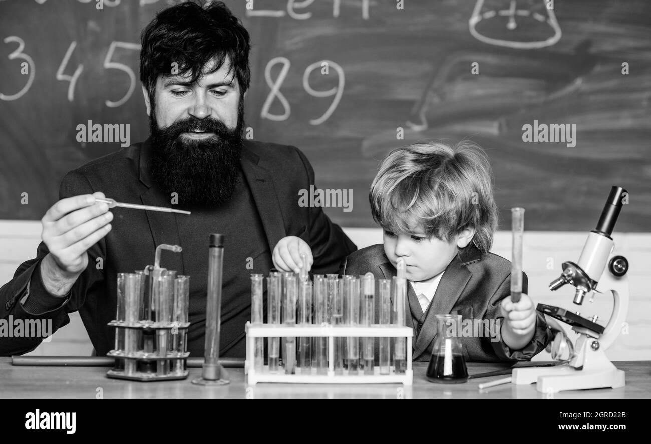 Genius toddler private lesson. Genius kid. Teacher child test tubes