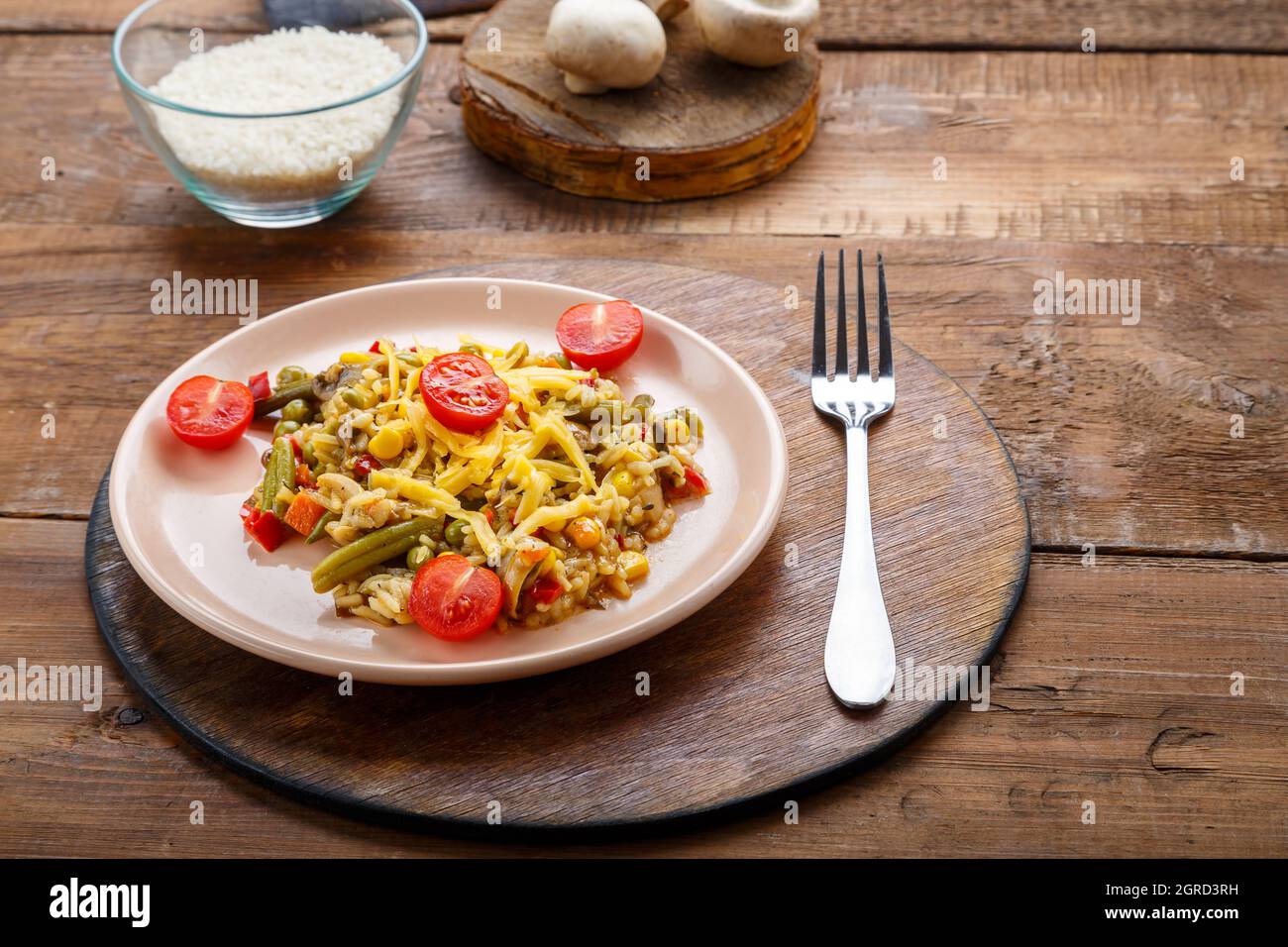 Risotto With Bends And Cheese In A Plate On A Wooden Background On A