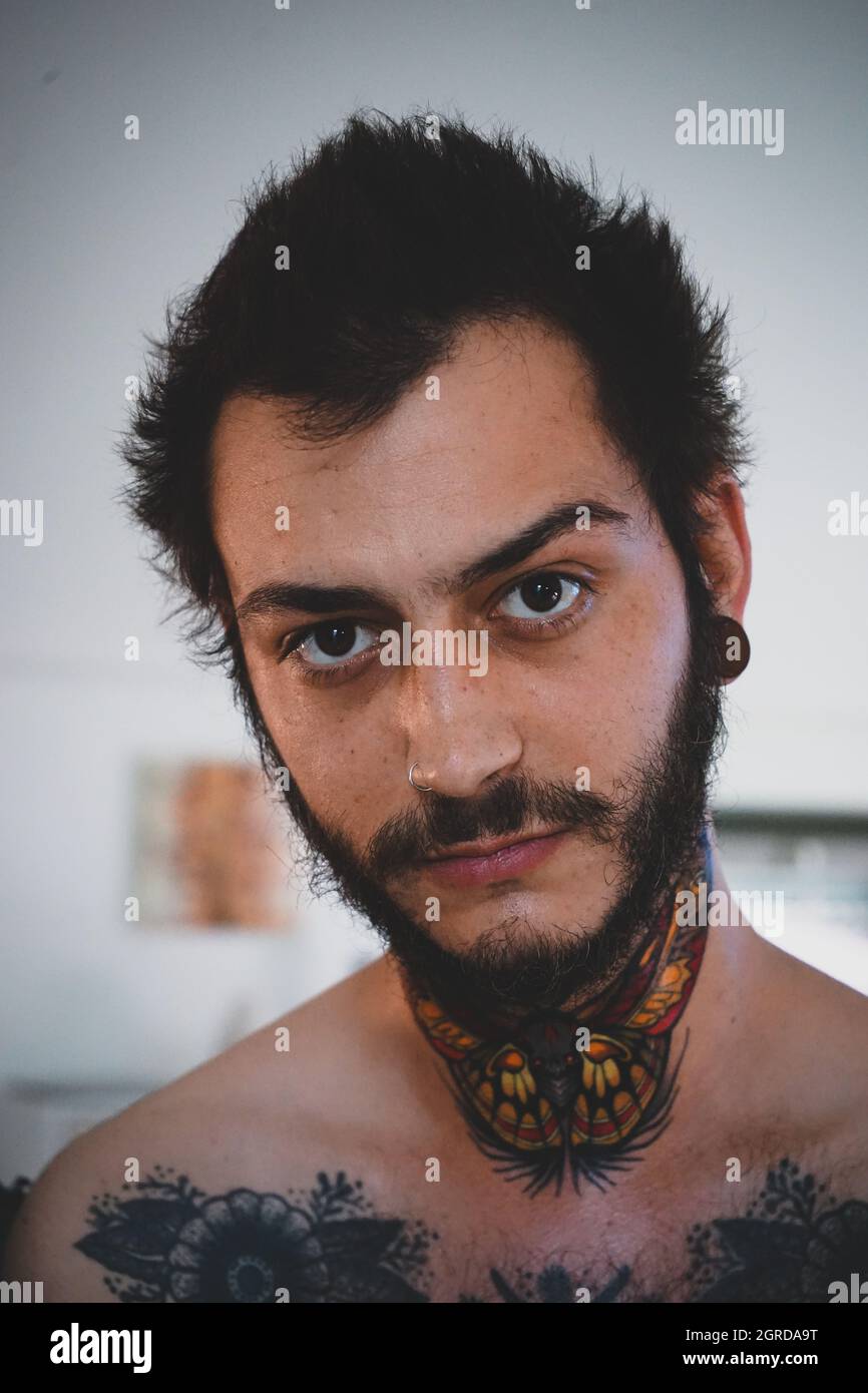 Man tattooed headshot hi-res stock photography and images - Alamy