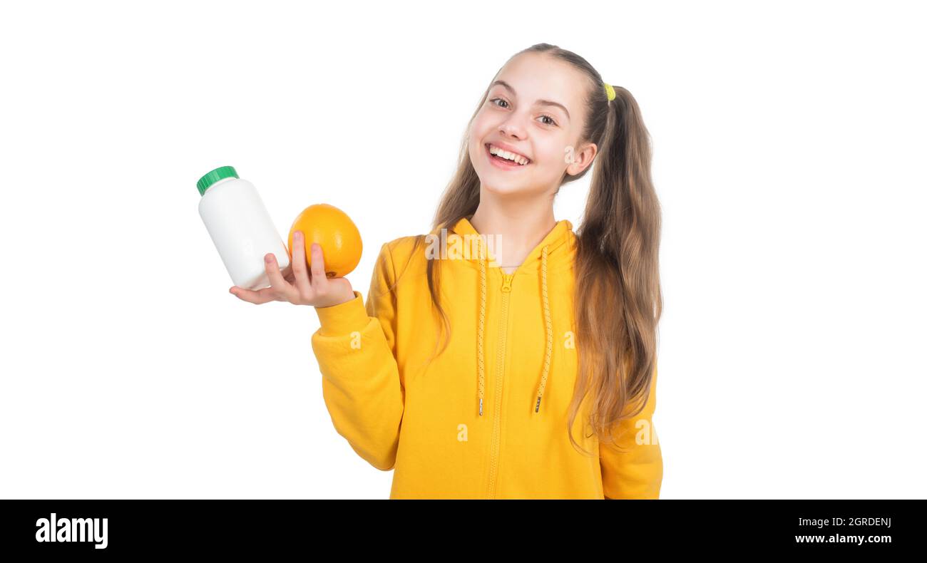 effervescent tablet for kids. happy girl presenting vitamin c. organic