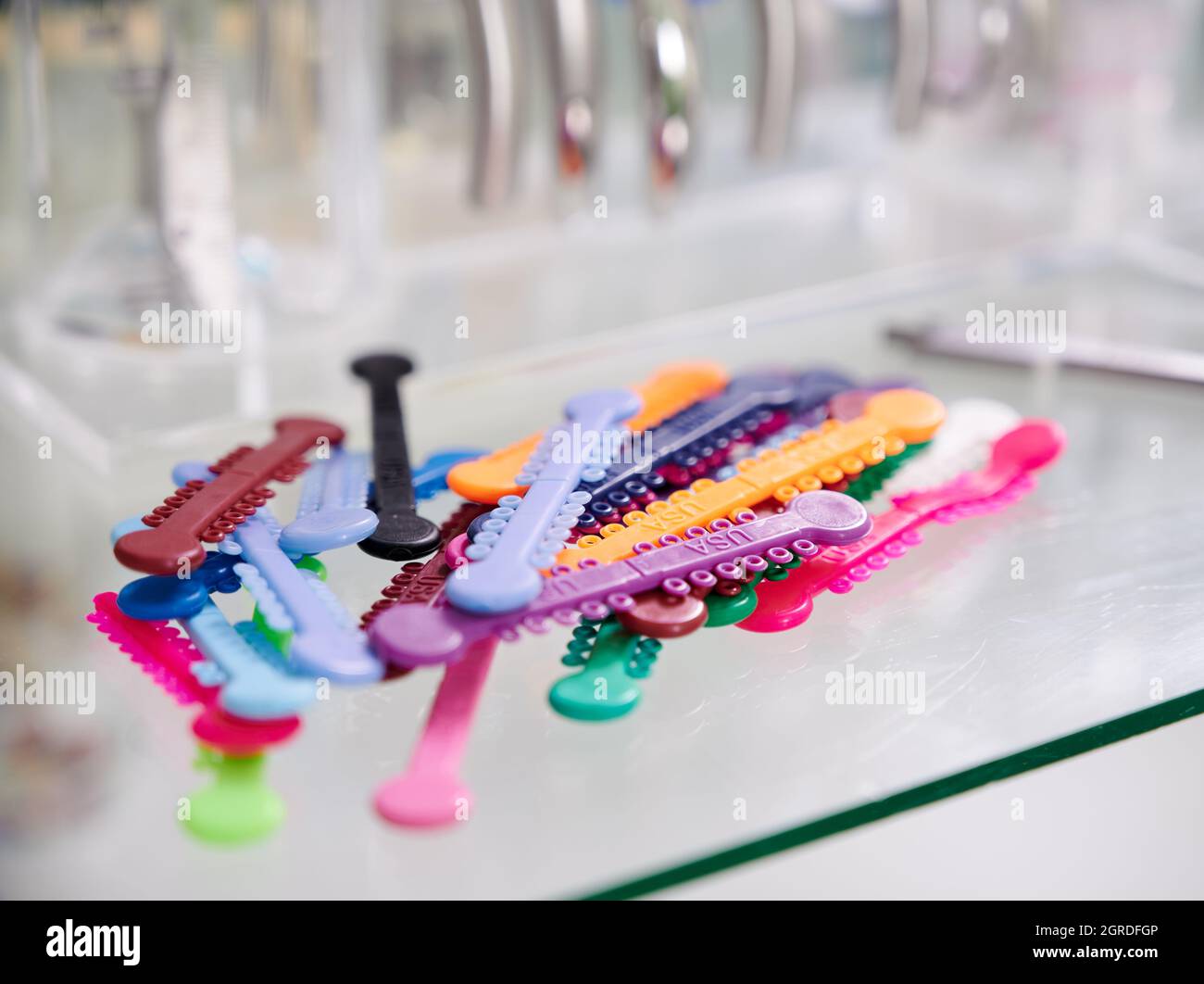 Close up of orthodontic ligature ties for procedure of putting on