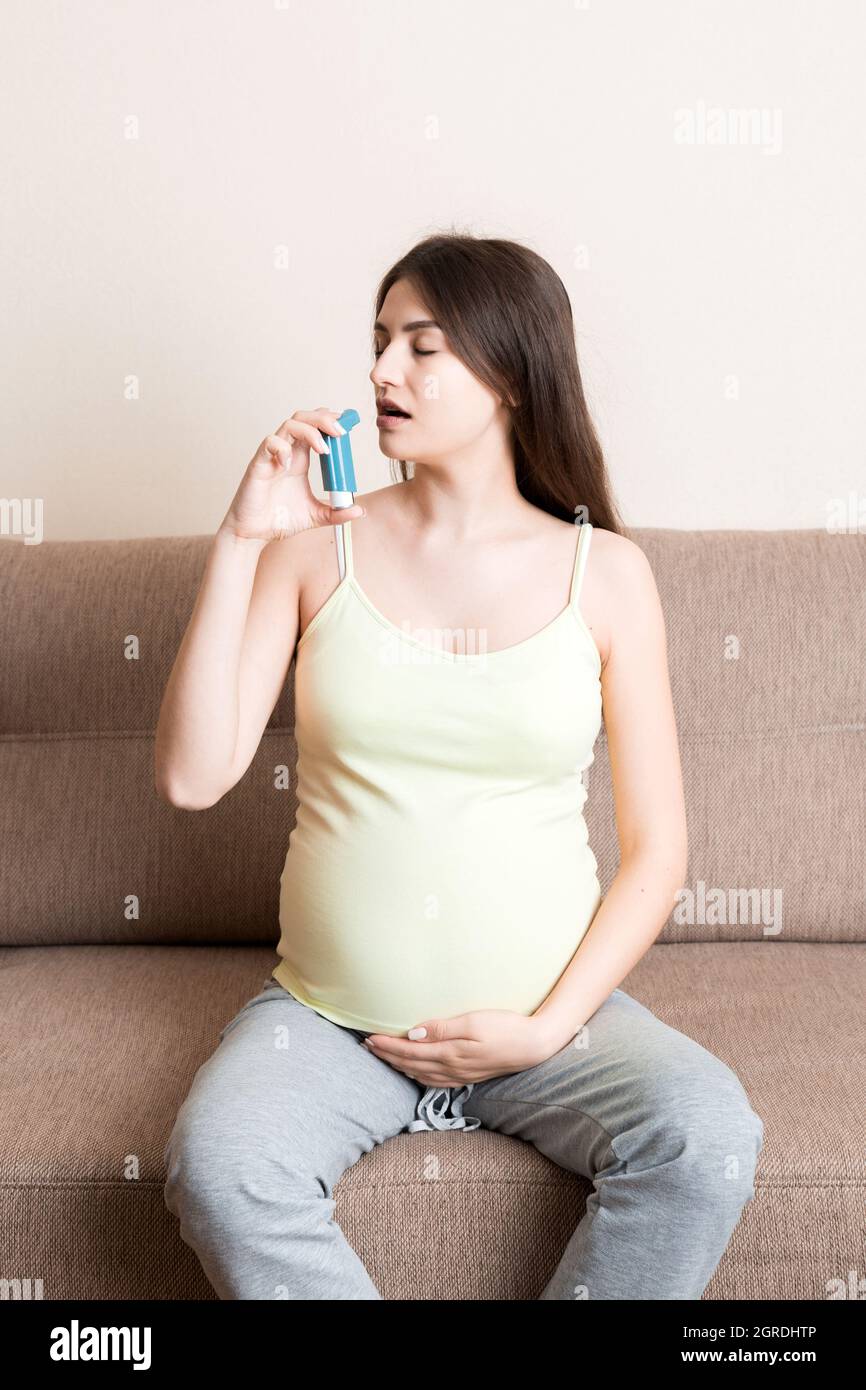 Pregnant Woman Using Asthma Inhaler During Attack For Being Healthy On