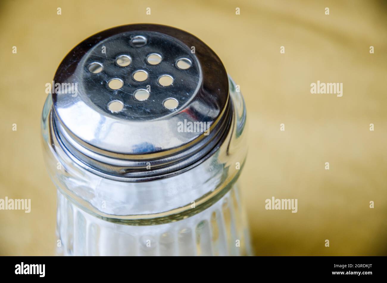 Close-up Of Metallic Sugar Cap Jar Stock Photo