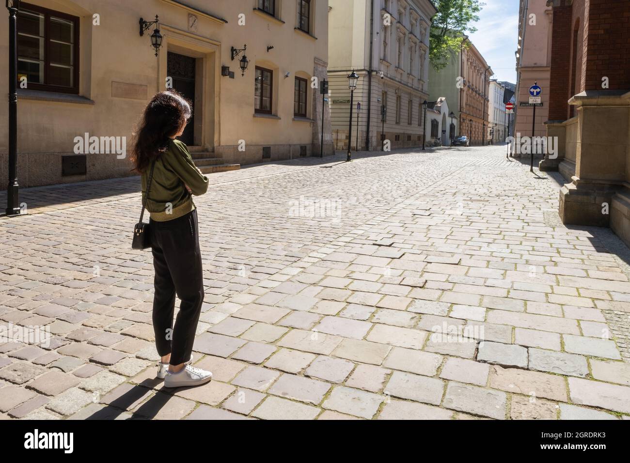 Old woman standing on the street hi-res stock photography and images ...