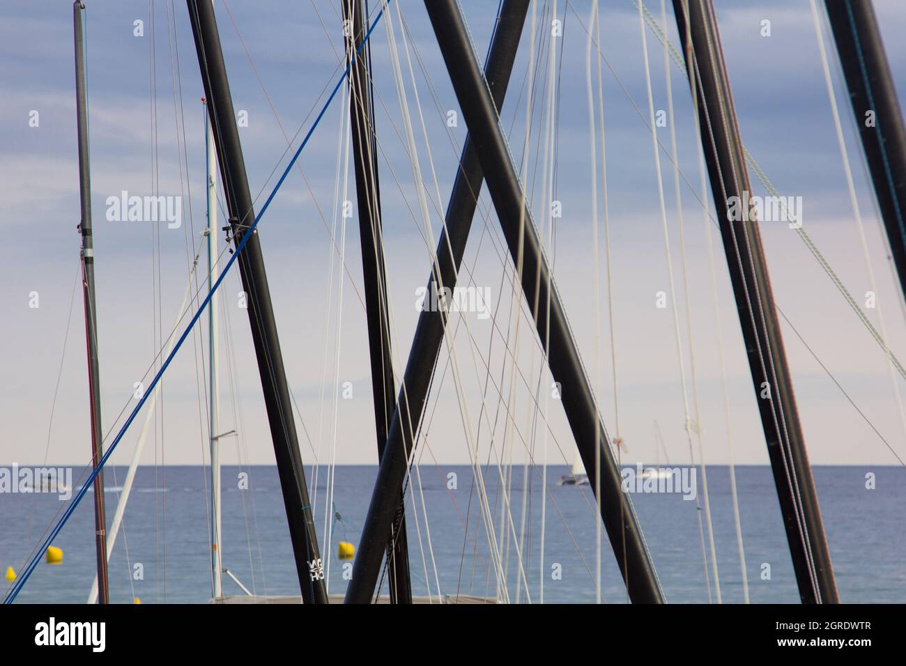Colorful canoes and sails, sail masts Stock Photo Alamy