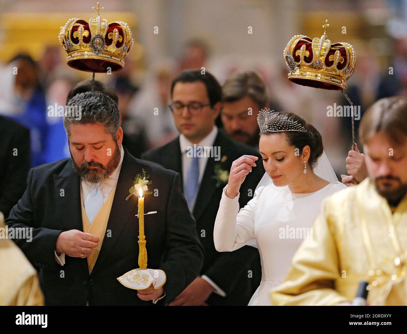 Grand Duke George Mikhailovich Romanov and Victoria Romanovna Bettarini  cross themselves during their wedding ceremony at St. Isaac's Cathedral in  Saint Petersburg, Russia October 1, 2021. REUTERS/Anton Vaganov Stock Photo  - Alamy