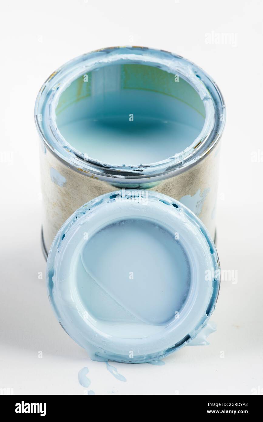 Opened paint can with lid close-up Stock Photo