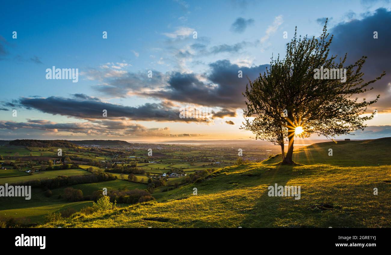 Sunset view across the Severn Vale from Coaley Peak, Gloucestershire Stock Photo