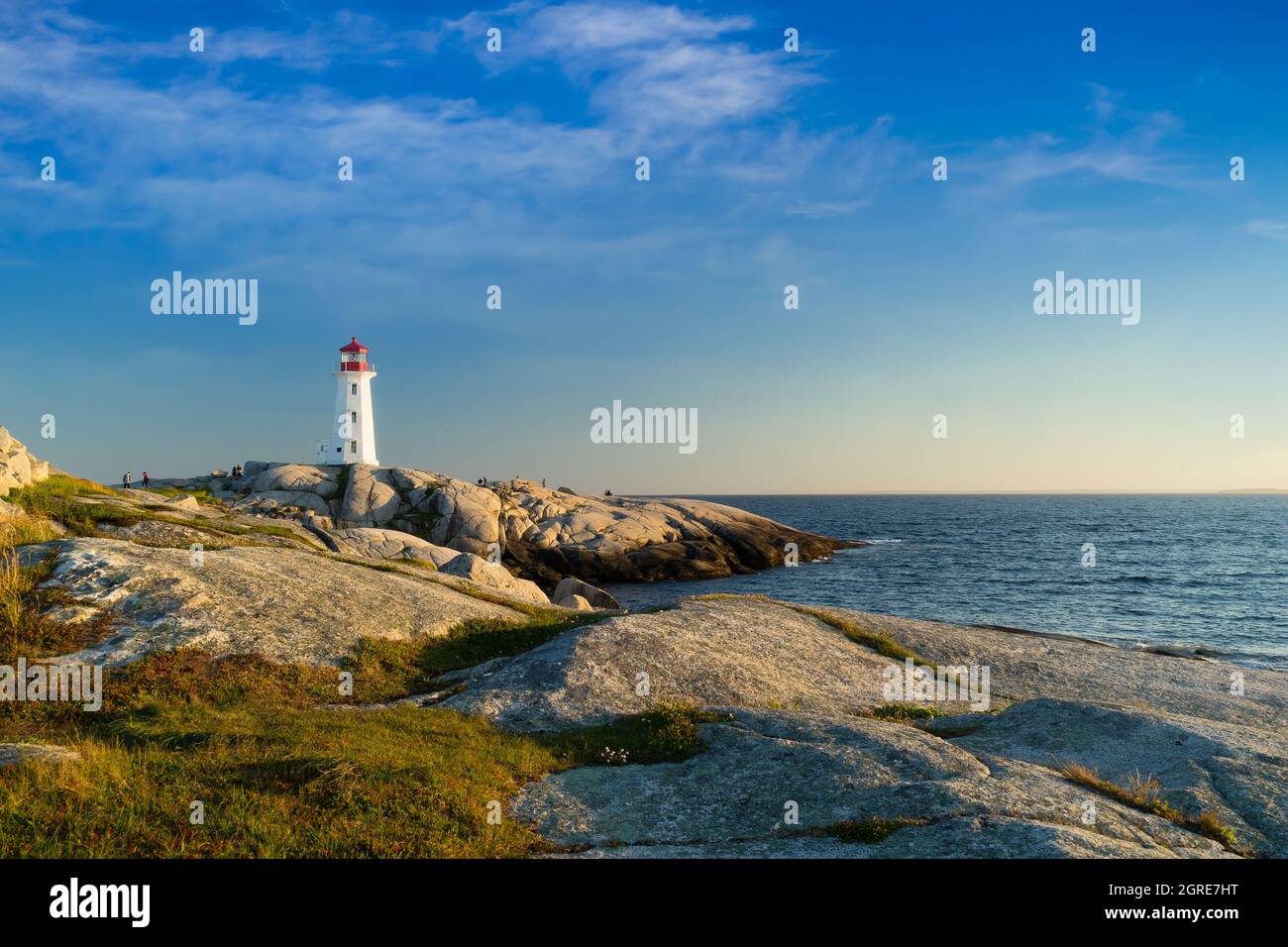 The iconic lighthouse overlooking the Atlantic at Peggy's Cove, Nova Scotia Canada. Stock Photo