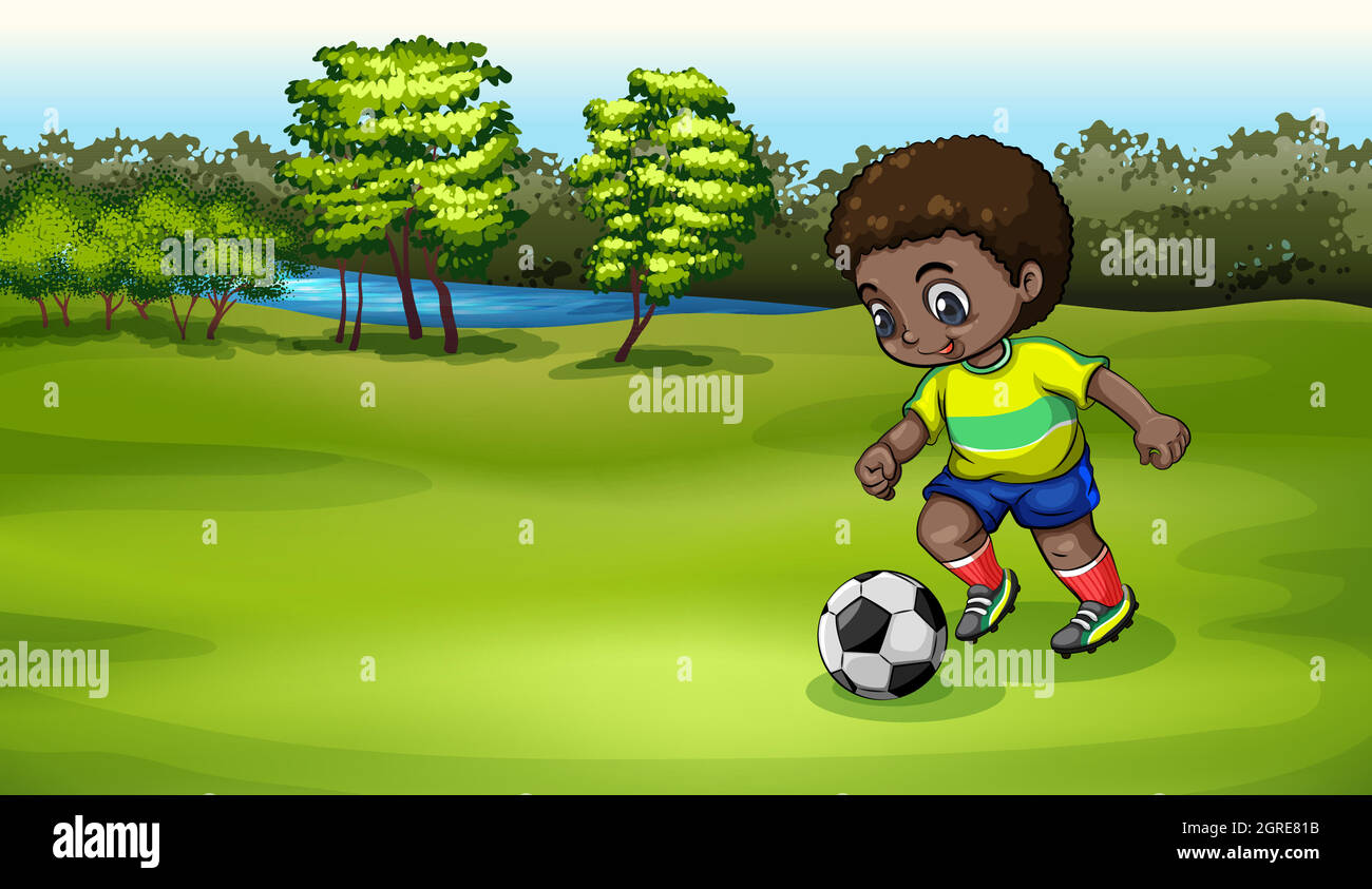 A young boy playing soccer near the river Stock Vector