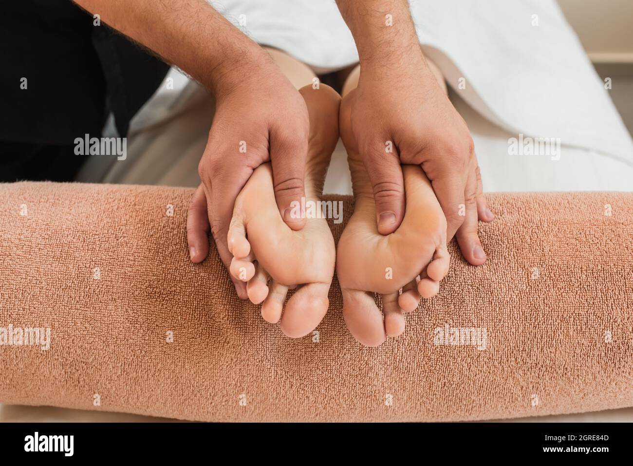 Doing feet massage hi-res stock photography and images - Alamy