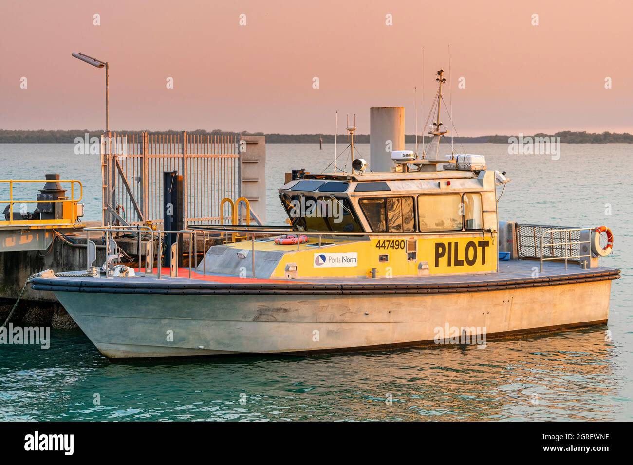 Pilot boat moored beside refueling jetty at Evan's Head, Port of Weipa, Cape York, North Queensland. Stock Photo