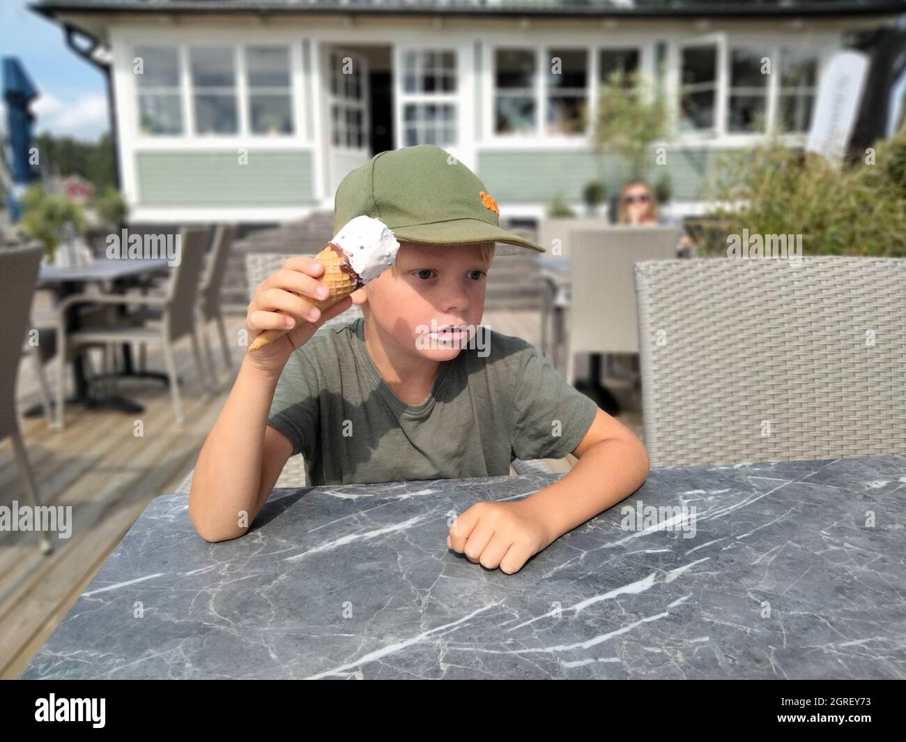 Portrait Of Boy Holding Ice Cream Stock Photo