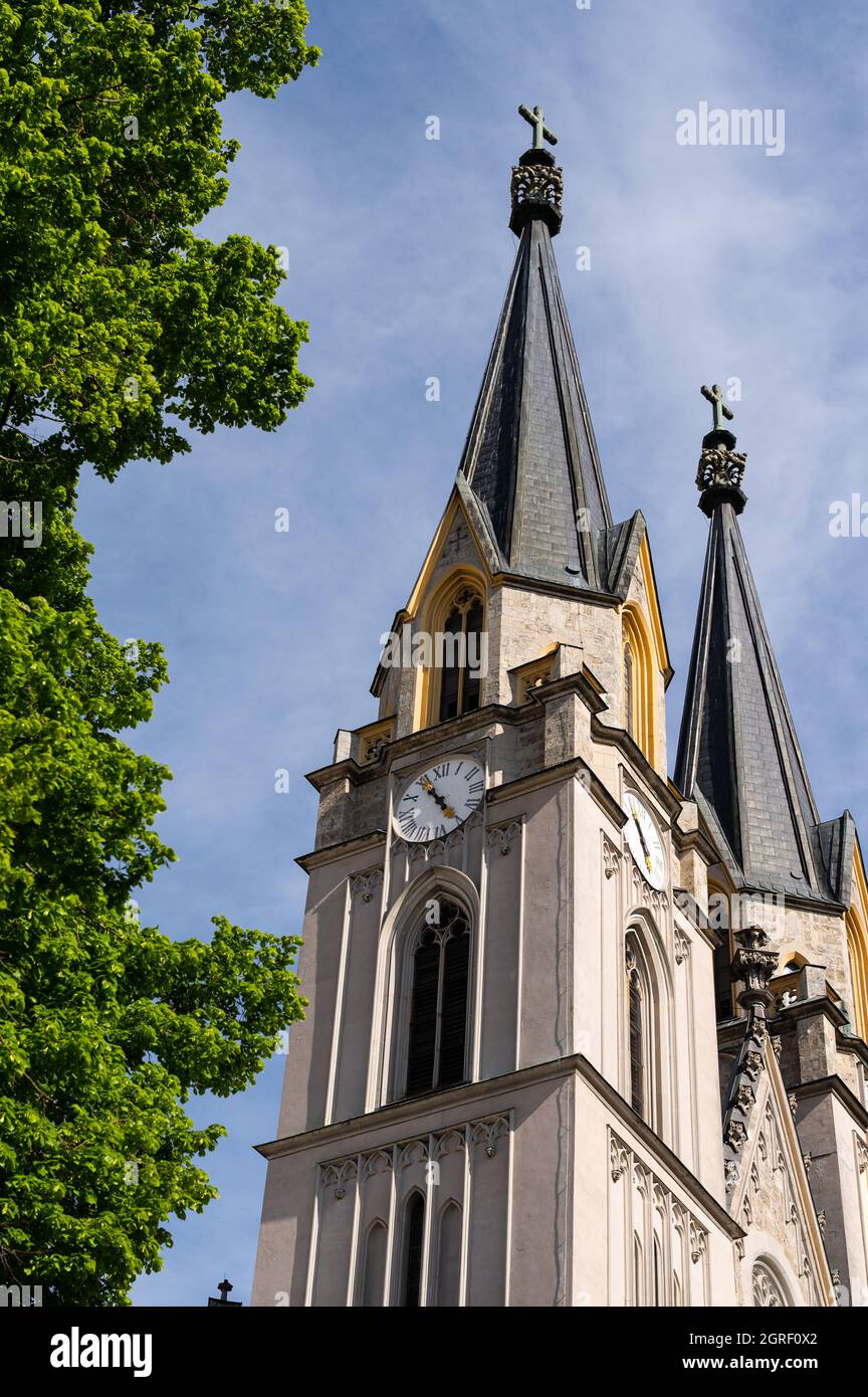 Church tower of Admont (Austria) on a sunny day in springtime, blue sky Stock Photo