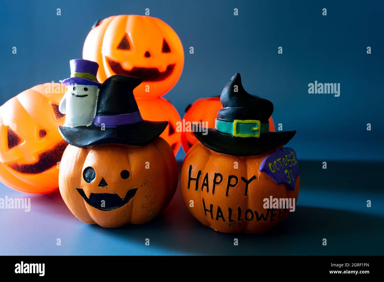 Jack O Lantern Pumpkin On A Blue Background Stock Photo