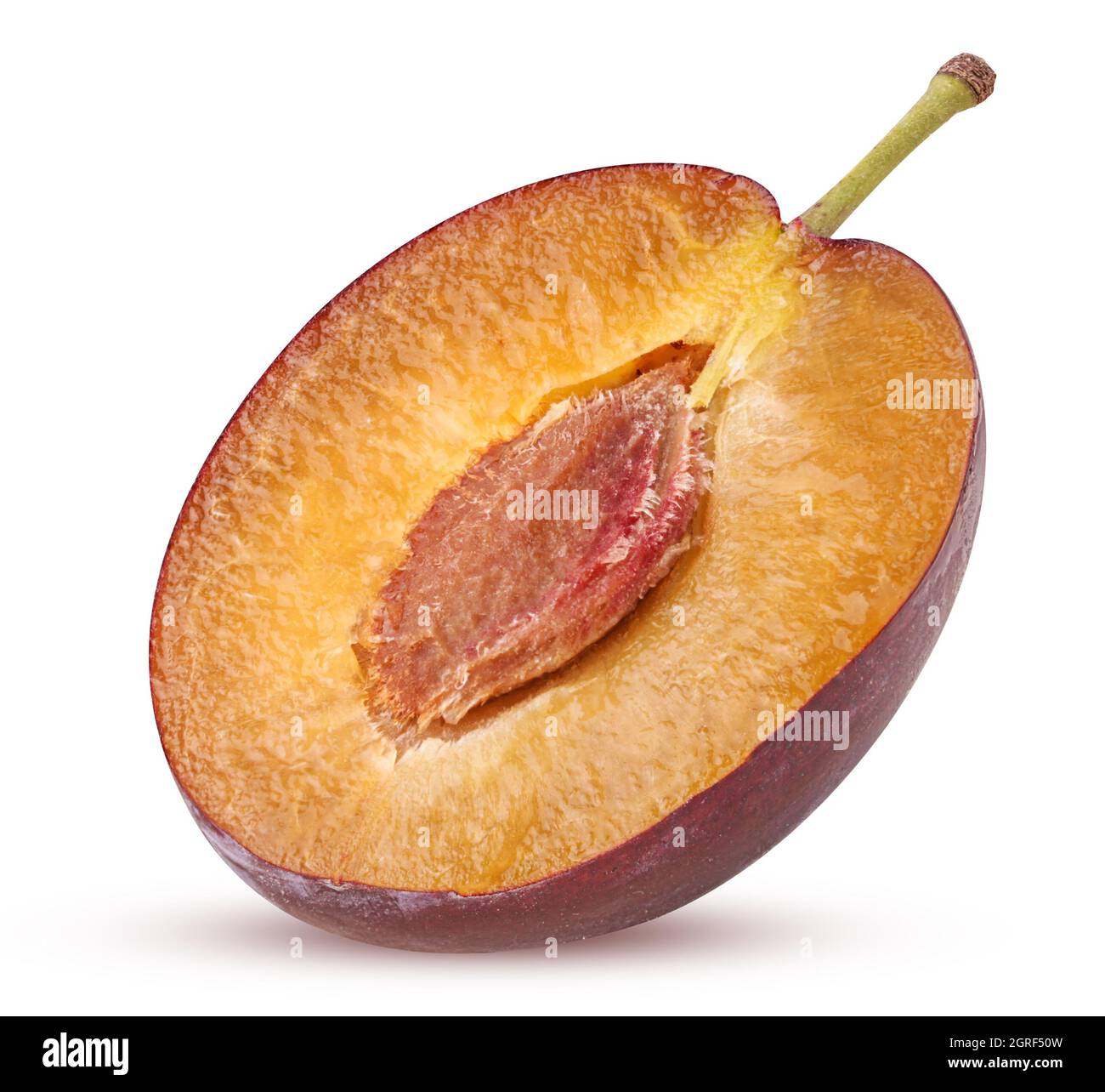 Fresh plum cut in half with bone isolated on white background Clipping Path. Full depth of field